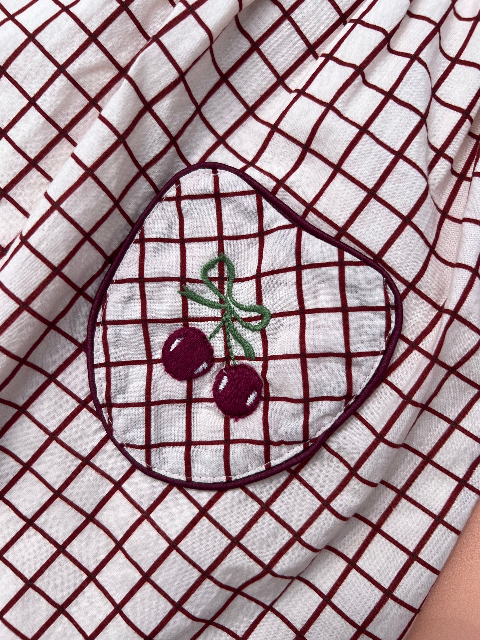 Kids organic cotton cherry embroidered pocket dress in check with scallop sleeves 