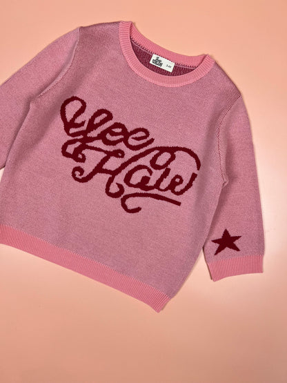 Pink kids merino wool knitted jumper with playful yeehaw cowboy design