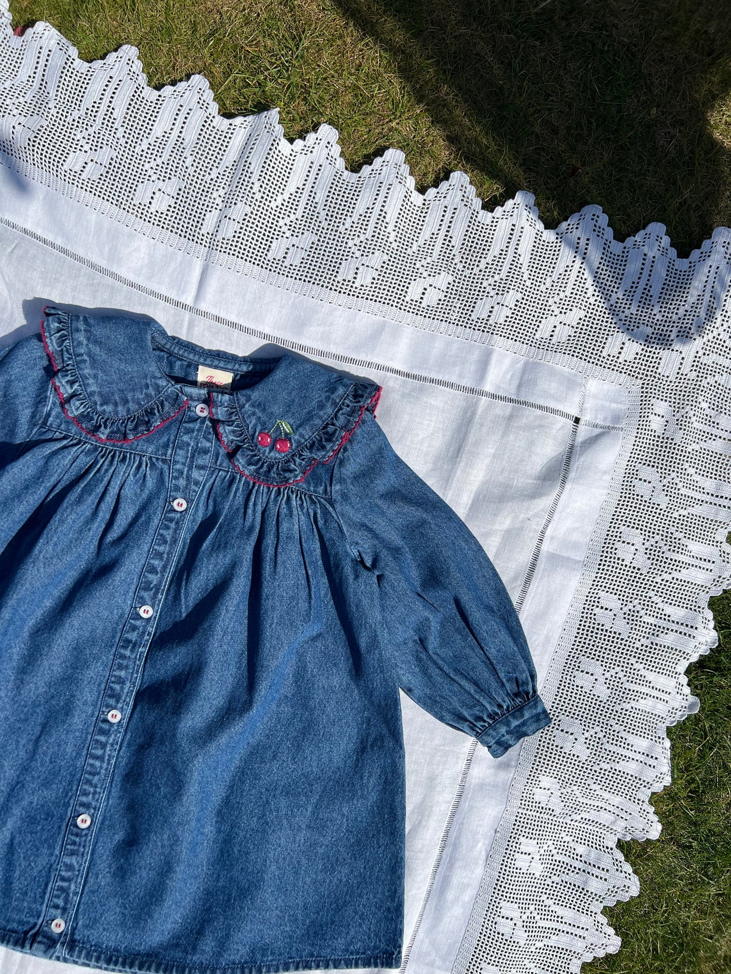 girls organic denim dress with frilly collar and cherry embroidery vintage inspired sailor dress  designed for girls aged 1-5 years.