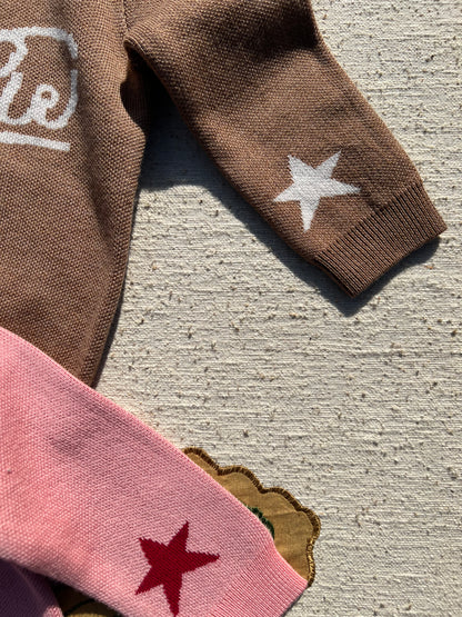 kids Brown and pink jumpers with star designs 