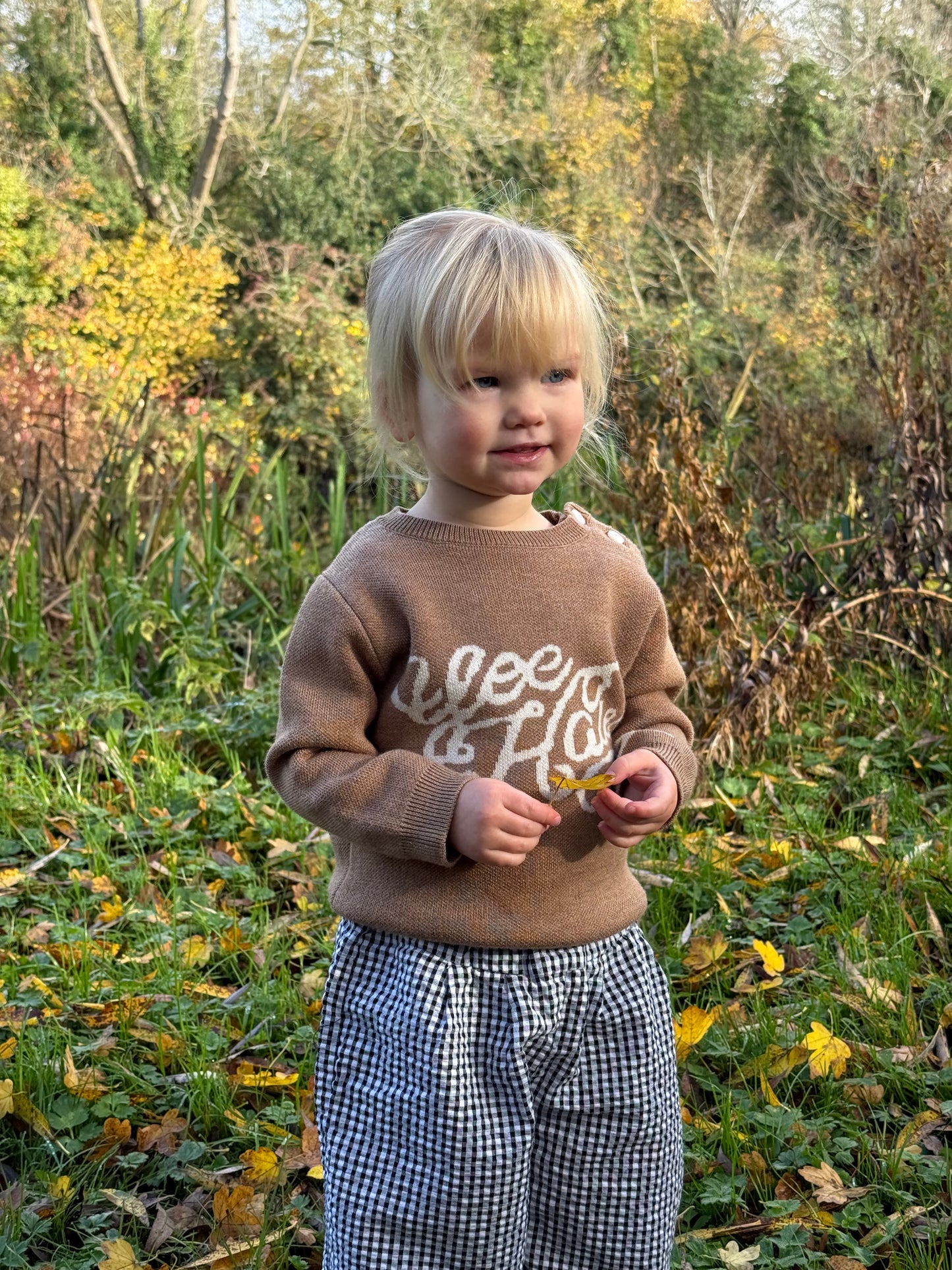Children’s brown merino wool jumper featuring a cute yeehaw motif