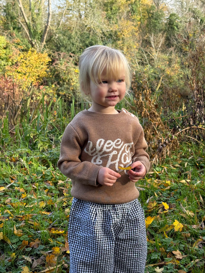 Children’s brown merino wool jumper featuring a cute yeehaw motif
